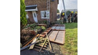 Hampshire hit by tornado causing destruction to trees and homes.