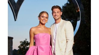 Fan-favorite ignores 'curse' gossip, praises her boyfriend as the most attractive man on Earth.