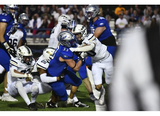 Broomfield narrowly beats rival Legacy in intense football game.