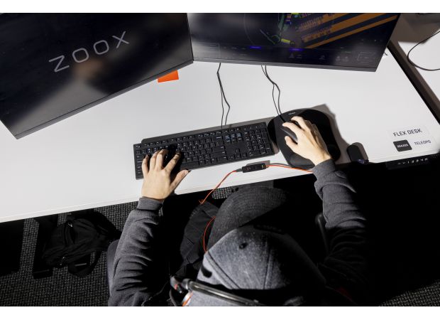 Undiscovered individuals assist autonomous vehicles in maneuvering through urban roads.