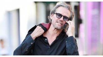 Former 90s pop star caught on camera receiving parking violation.