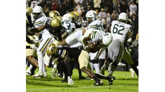 CU Buffs defeat Baylor 38-31 in OT after a stunning comeback; photos show key moments throughout the game.