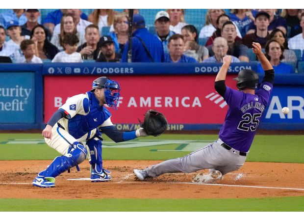 McMahon's home run gives Rockies win over Dodgers in 6-3 victory despite being in last place.