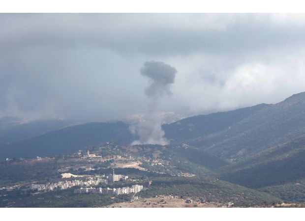 Hezbollah launches over 100 rockets at Israel.