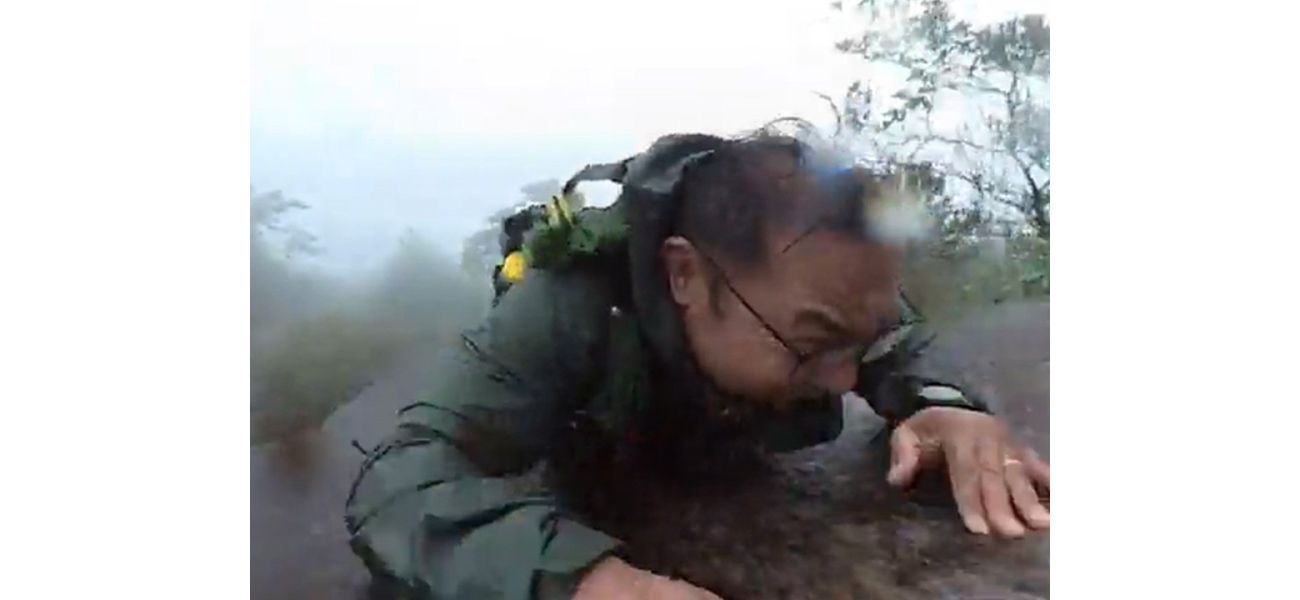 Hiker falls down mountain, records incident on camera.