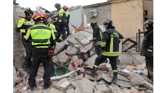 A mother and her two young children, ages 4 and 6, died in a suspected gas explosion that destroyed their apartment building.