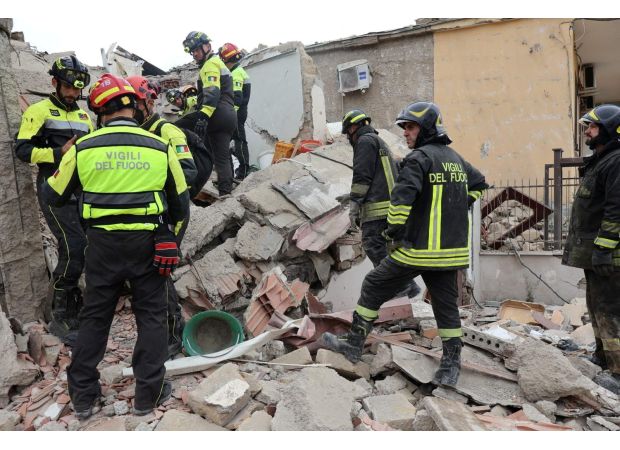 A mother and her two young children, ages 4 and 6, died in a suspected gas explosion that destroyed their apartment building.