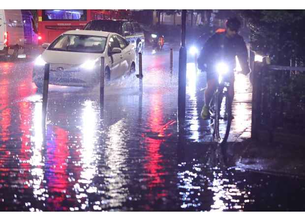 Travel disruptions as flooding affects both Tube lines and motorways for commuters.