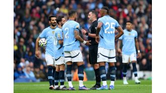 Criticism for Michael Oliver's poor performance in a crucial decision for Arsenal against Man City.