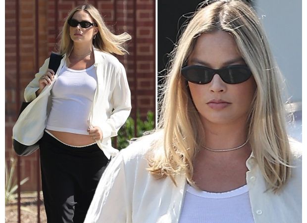 Margot Robbie, who is in her late stages of pregnancy, was spotted running errands while showing off her bare baby bump.
