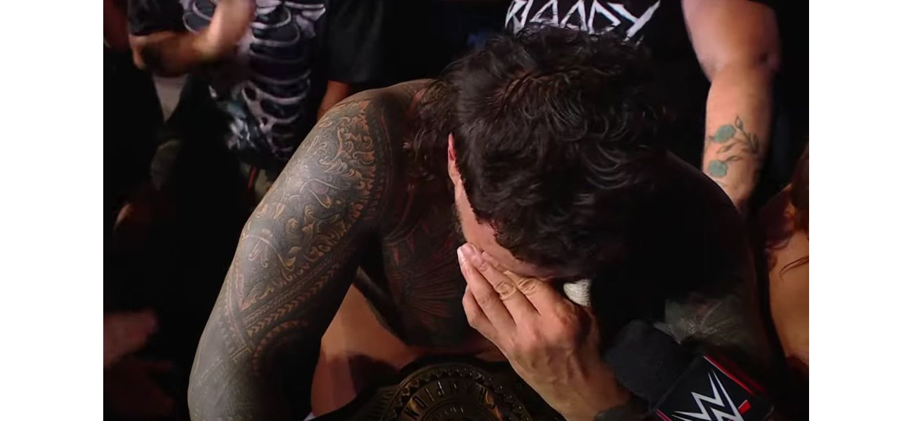 Wrestler emotional after 14-year wait for first singles title win.