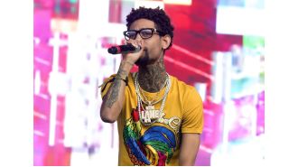 Father sentenced to 31 years to life for aiding son in robbery and murder of rapper PnB Rock.