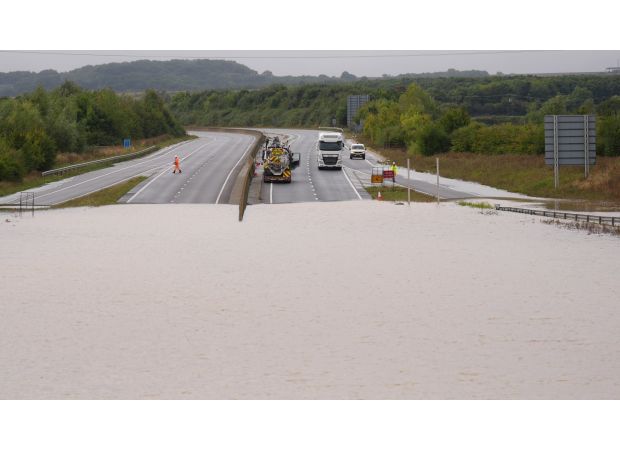 Travelers are dealing with increased difficulties as flooded roads and rail lines persist.