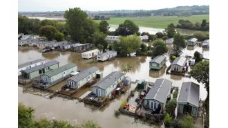 Northampton caravan park evacuated due to flooding chaos.