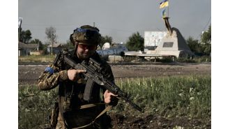 Ukrainian forces regain strategic land after defeating Russians in close-range battle.