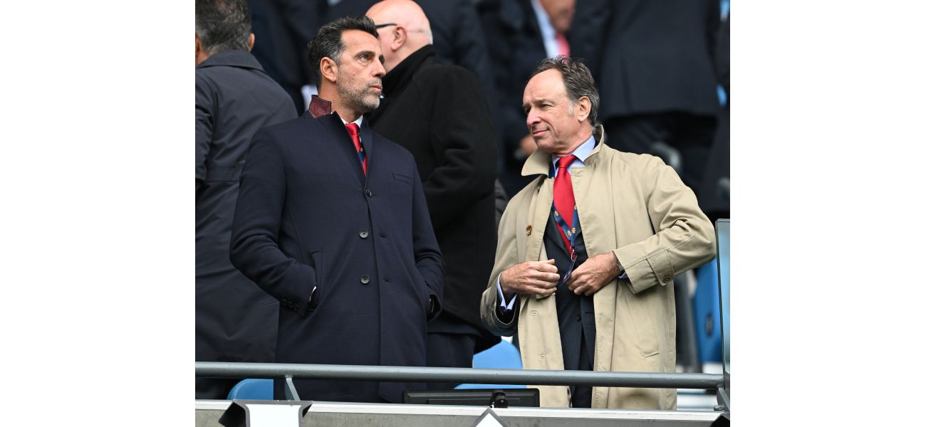 Arsenal executive snubs handshake from Manchester City executives during tense moment in director's box.
