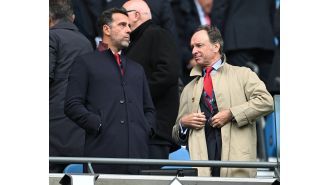 Arsenal executive snubs handshake from Manchester City executives during tense moment in director's box.