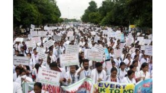 Nurses' strike prompts government to threaten consequences.