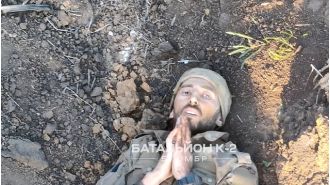 A Ukrainian drone displays an act of mercy by rescuing a wounded Russian soldier, saving their life.