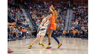 DiJonai Carrington denies purposely poking opponent in the eye during basketball game.