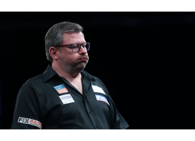 Darts player James Wade denies claims of 'sharting' during a match with a humorous statement.