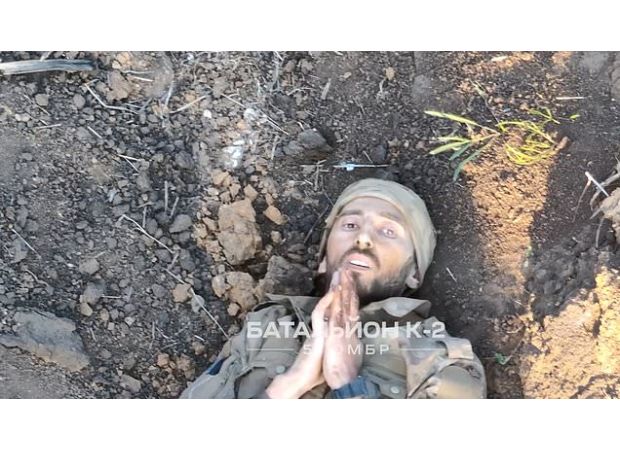 A Ukrainian drone displays an act of mercy by rescuing a wounded Russian soldier, saving their life.