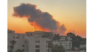 Israel reports attacking Hezbollah's main base in Lebanon.