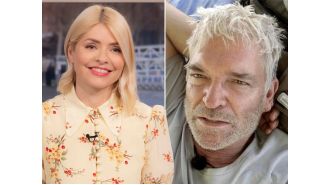 Phillip Schofield takes a cheeky jab at Holly Willoughby as they return to TV together.