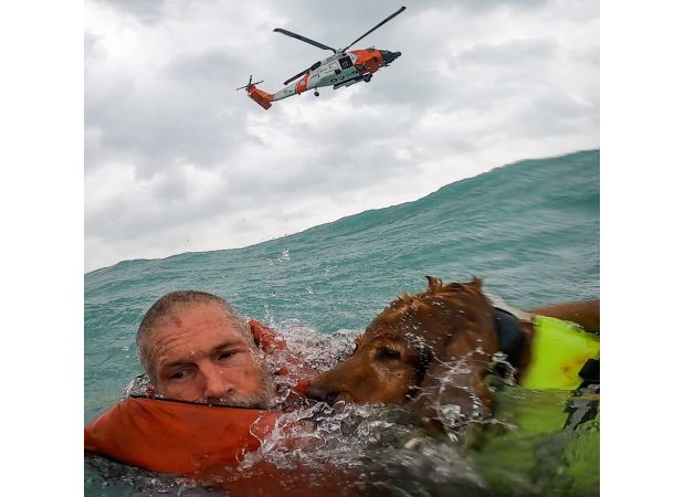 Sailor and dog saved from sinking boat during Hurricane Helene.
