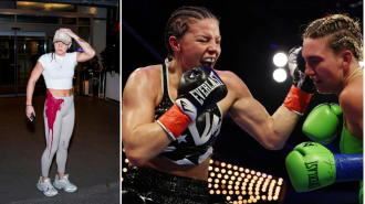 A UK boxer was splattered with red paint after being hit by a can before her world championship match.