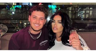 Katie Price and JJ Slater go on vacation despite bankruptcy.