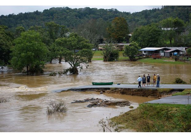 Expecting mother of two stuck in floodwaters.