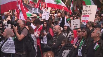 Lebanon's violence triggers unusual foreign policy division among top political groups.