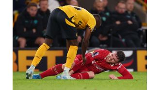 Liverpool manager Arne Slot expresses uncertainty about the severity of Andy Robertson's injury.