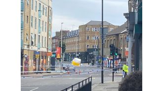 One person died and two were injured in a triple stabbing incident in Clapham.