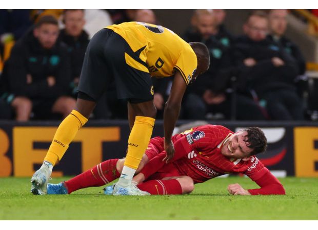 Liverpool manager Arne Slot expresses uncertainty about the severity of Andy Robertson's injury.