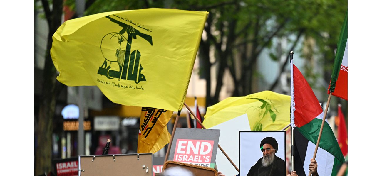 AFP says people waving Hezbollah flags can't be arrested for protesting.