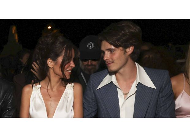 19-year-old Cruz Beckham makes public appearance with his 28-year-old model girlfriend during Paris Fashion Week.