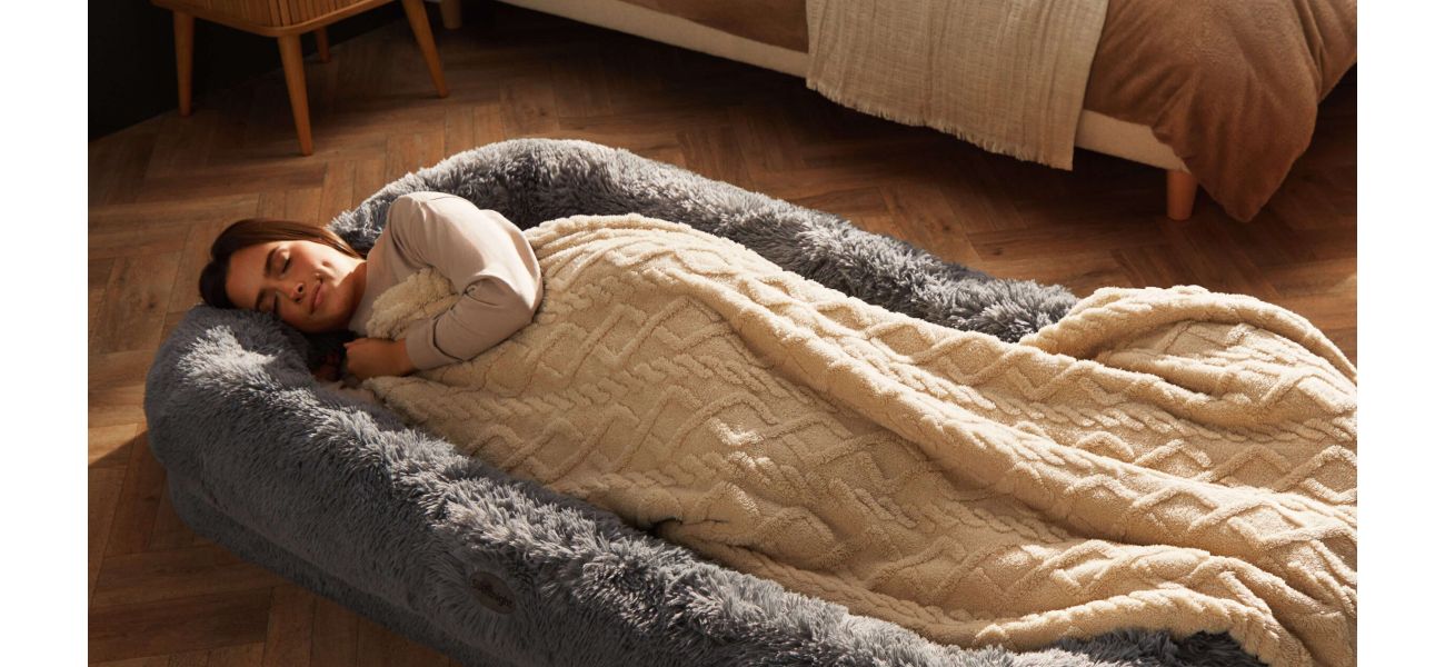 Introducing the Snuggle Pod - the ultimate cozy spot for naps and TV binges, perfect for humans and dogs alike.