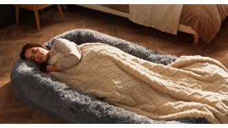 Introducing the Snuggle Pod - the ultimate cozy spot for naps and TV binges, perfect for humans and dogs alike.