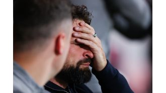 Bournemouth fans celebrate after learning that the last train to Southampton has been cancelled.