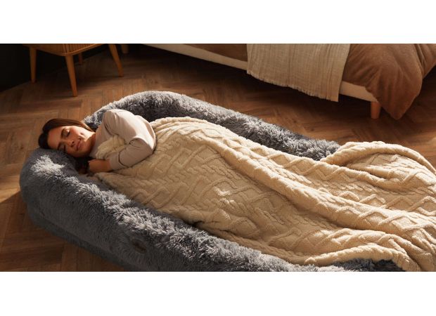 Introducing the Snuggle Pod - the ultimate cozy spot for naps and TV binges, perfect for humans and dogs alike.