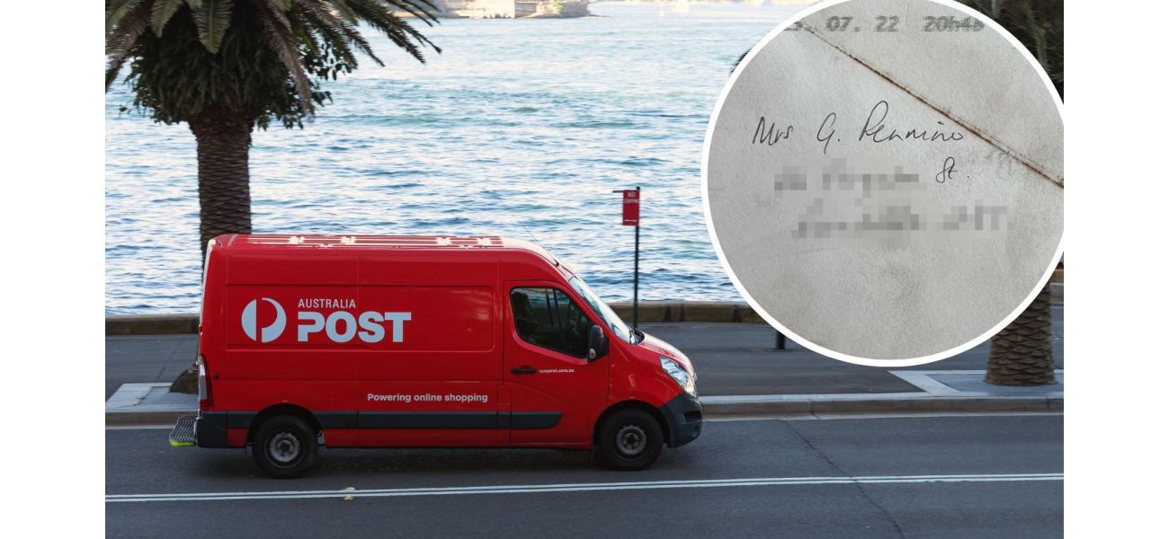 Woman perplexed by one detail on envelope.