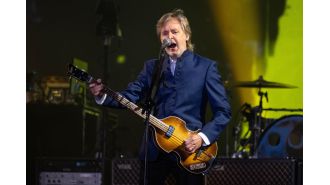Sir Paul McCartney teases debut of AI-produced Beatles song in live performance.