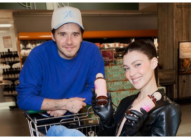 Brooklyn Beckham and Nicola Peltz debut their £15 hot sauce at Wholefoods.