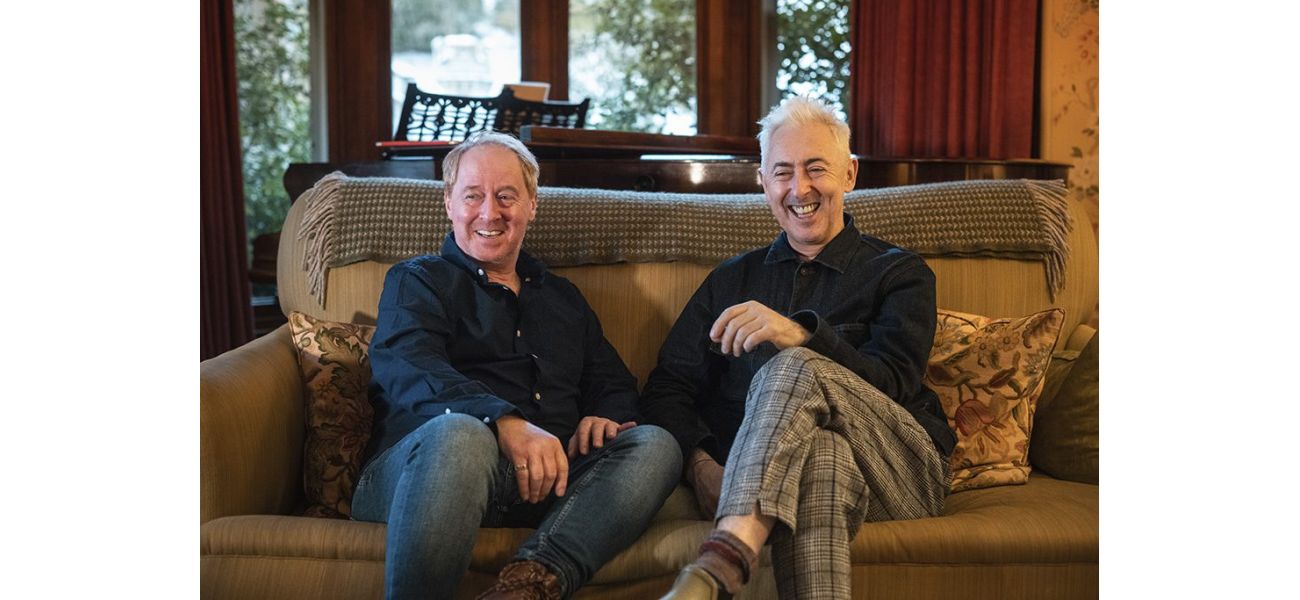 Alan Cumming praises the success of 'The Traitors' and encourages stepping outside of one's comfort zone.
