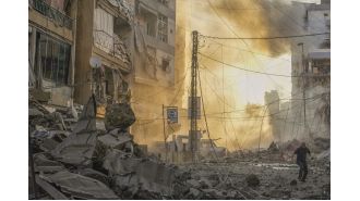 Israel's air attacks on Beirut disrupt travel into Syria via a vital crossing.