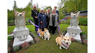 City officials use £35,000 for Corgi statues rather than repairing potholes, causing controversy.