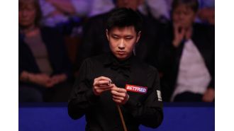 Former match-fixing suspect Zhao Xintong scores record-breaking 147 as he continues to make a comeback in snooker.