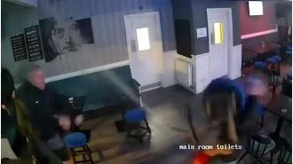 Guy immediately gets payback for spraying people in pub with fire extinguisher.